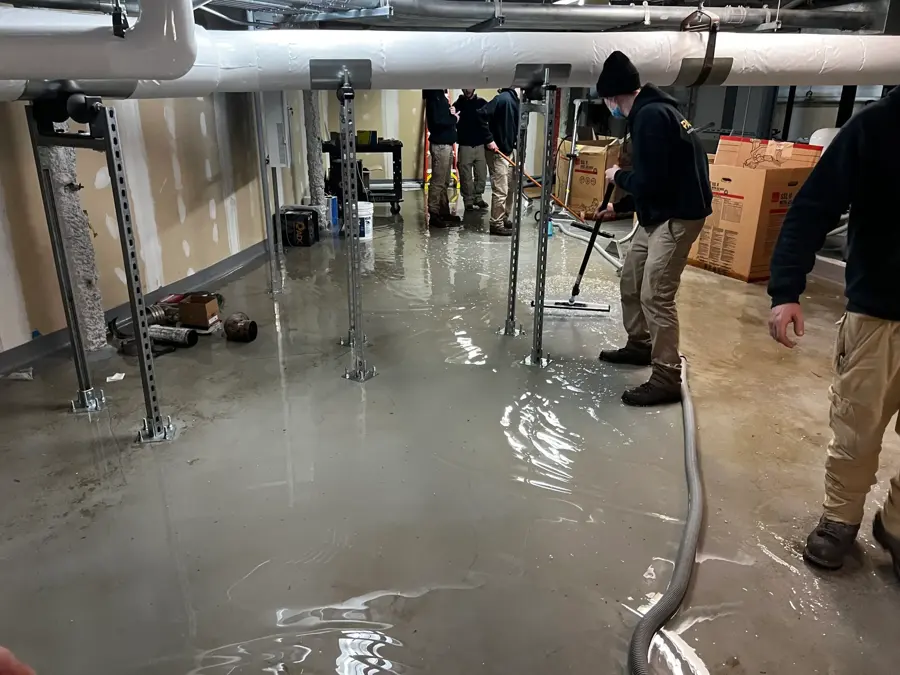 Drying equipment set on a wet carpeted floor