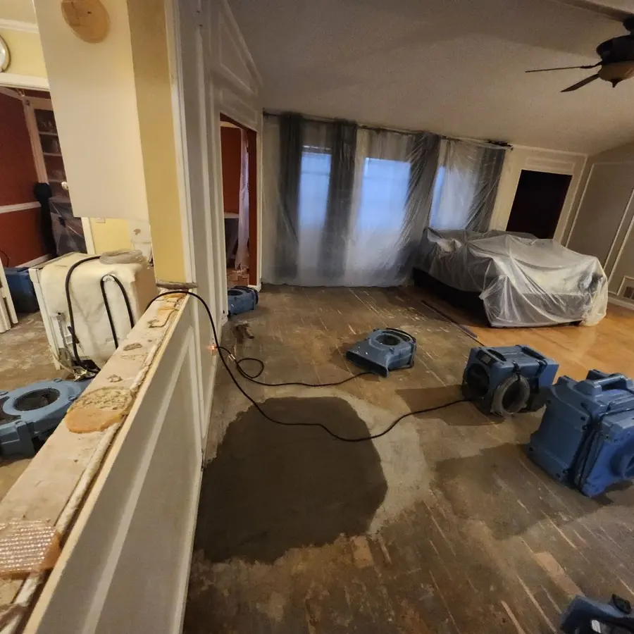 Frozen pipe flood dried across two rooms in a Bedford, TX home