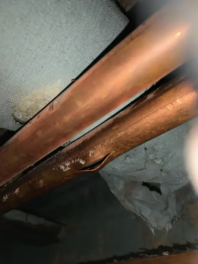 Frozen pipe water damage in a Bedford, TX ceiling